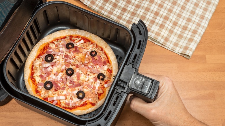 Pizza in air fryer basket