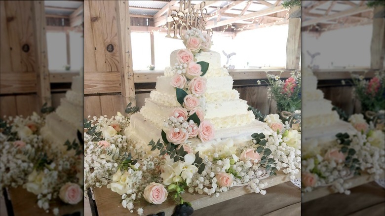 Multi-tiered wedding cake with flowers