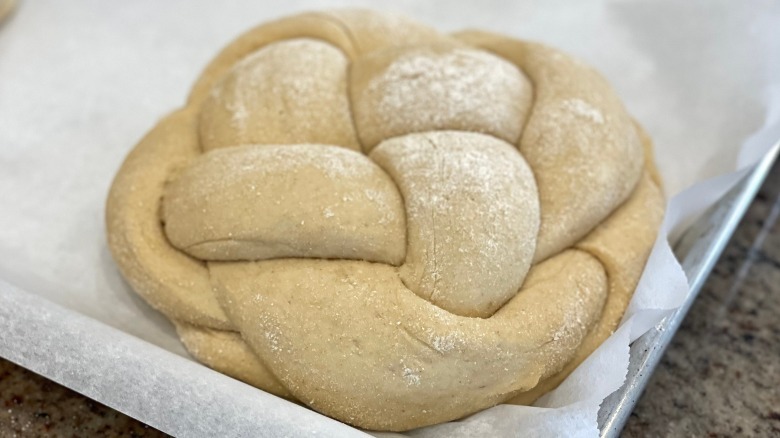 Round braided challah dough