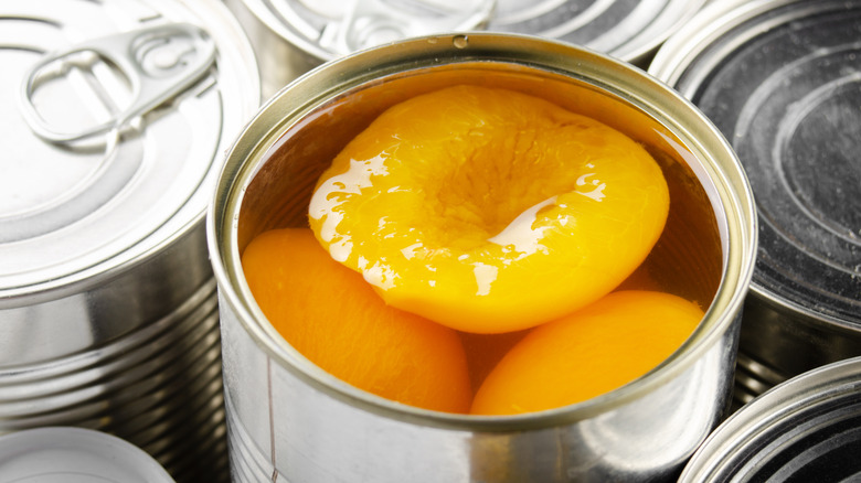 Opened can of peaches