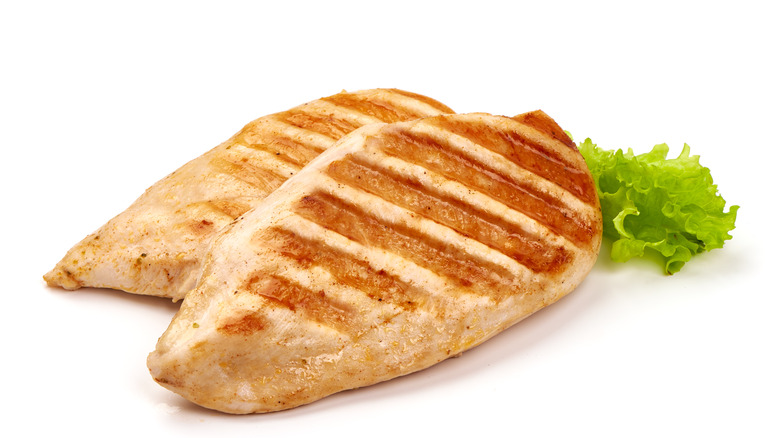 grilled chicken against white backdrop