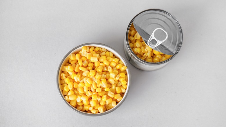 Open cans of corn
