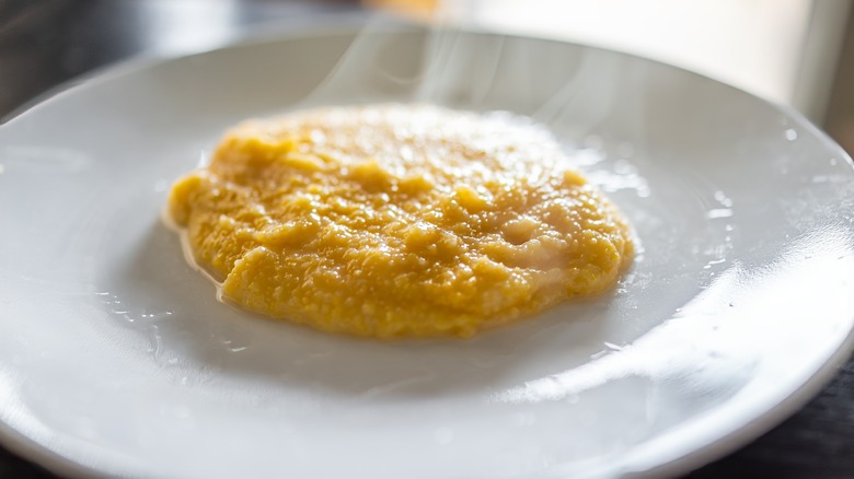 Cooked grits on plate