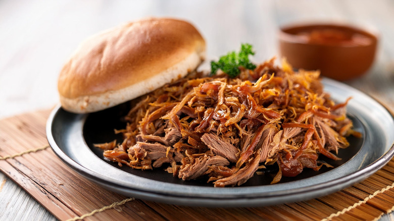 serving of pulled pork with bread