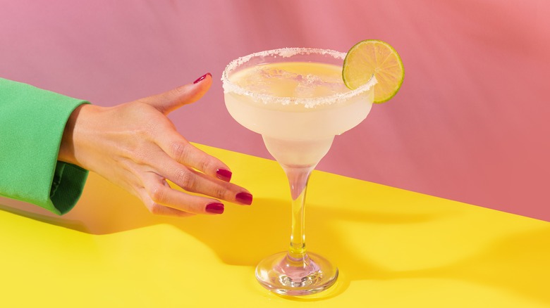 hand reaching for margarita