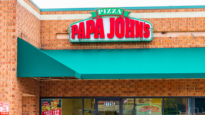 A Papa John's storefront and sign