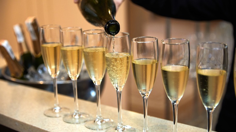 Champagne being poured into glasses