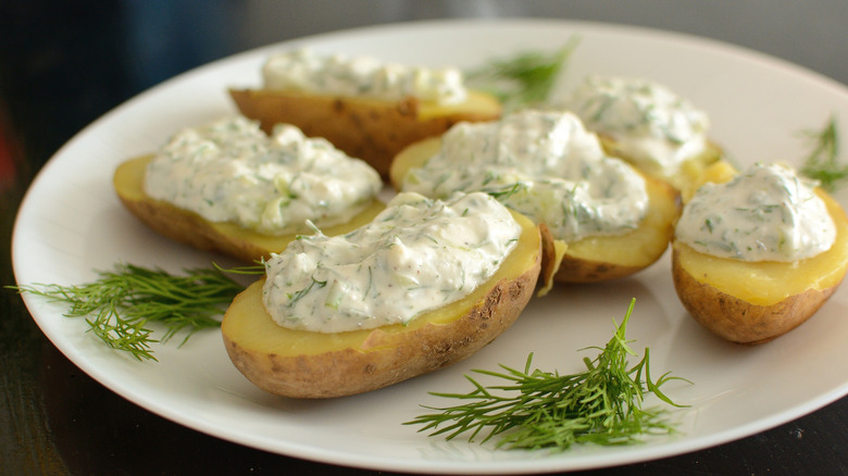 Several potatoes topped with gzik