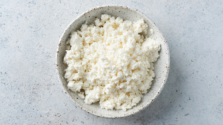 A bowl of cottage cheese pictured from above