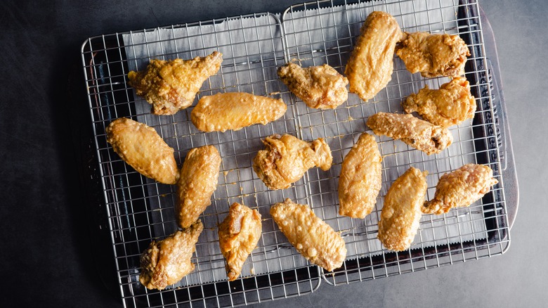 Crispy wings on baking tray