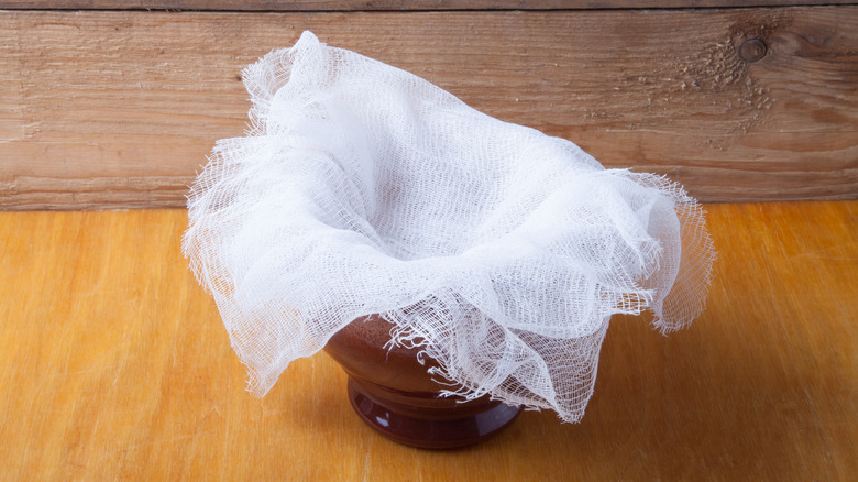 layers of cheesecloth in bowl