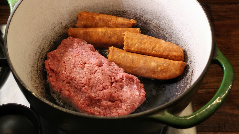 longaniza and ground beef in pot