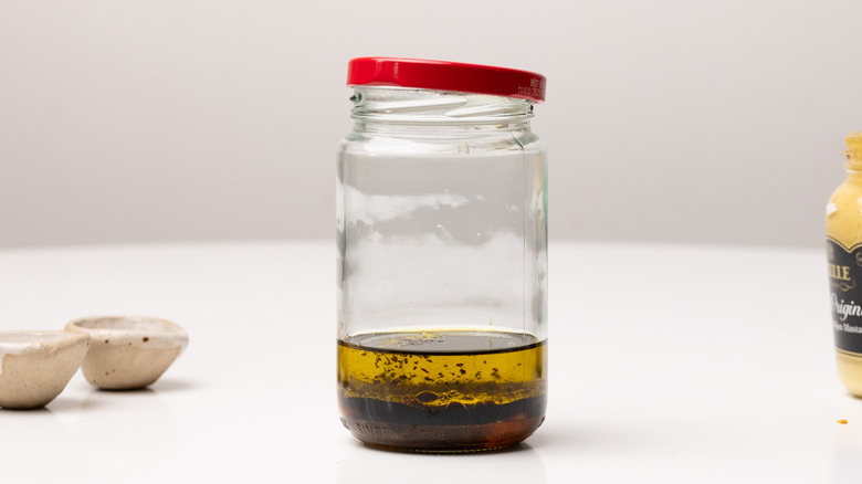 mixing salad dressing in jar