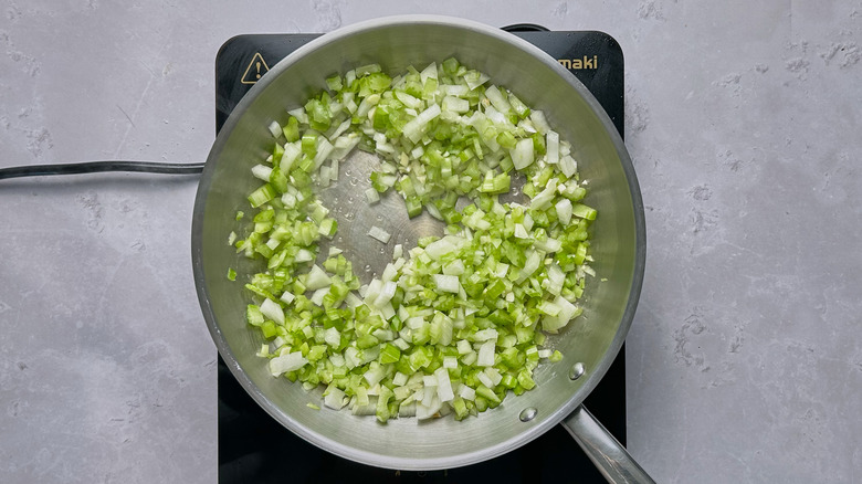 onion and celery in a skillet