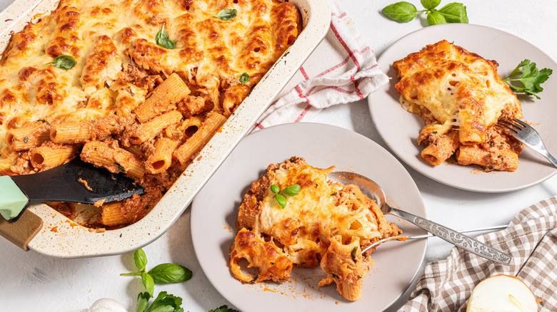 Casserole baked pasta with two portions on plates
