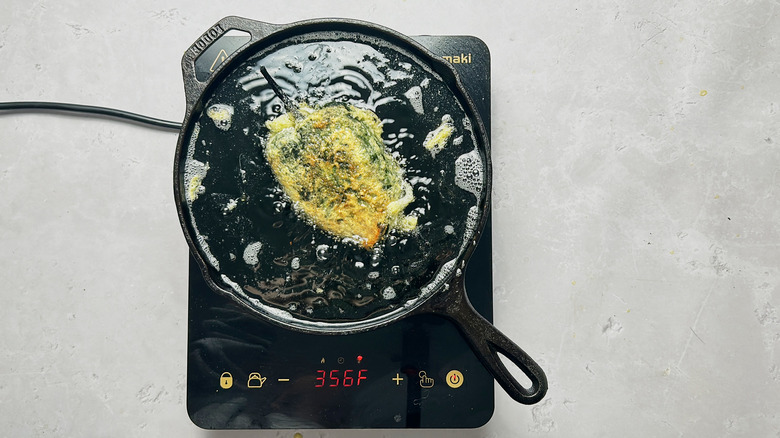 frying chile relleno in oil