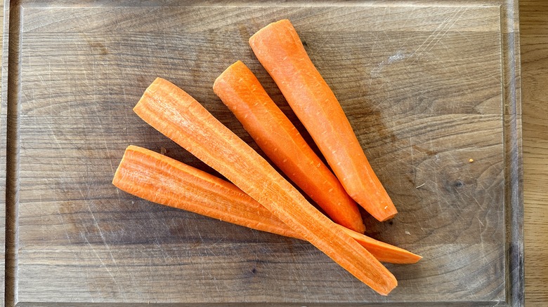 Chopped carrots on cutting board