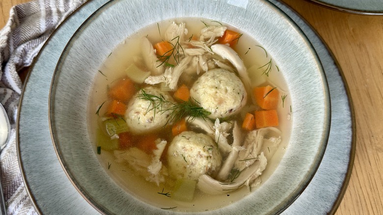 Matzo ball soup in bowl