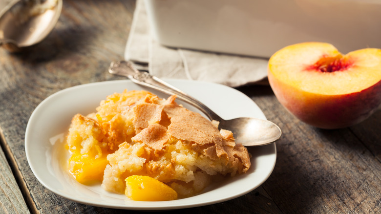 Plate of peach cobbler with ice cream