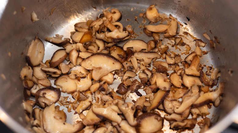 mushrooms cooking in pan 