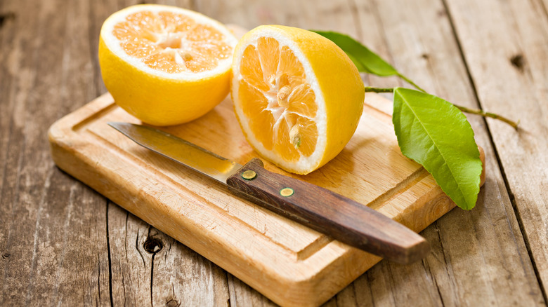 Lemons on cutting board