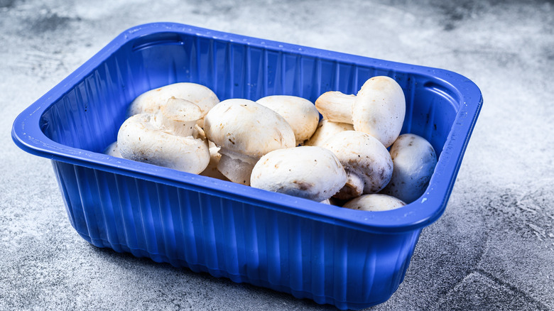 Packaged white mushrooms