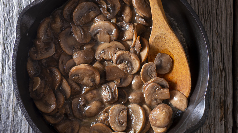 Cooked mushrooms in pan