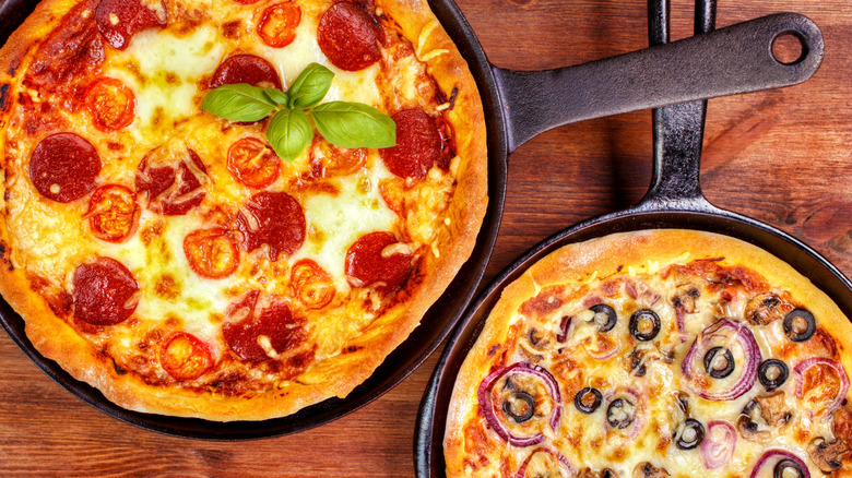 pizzas in cast iron pans