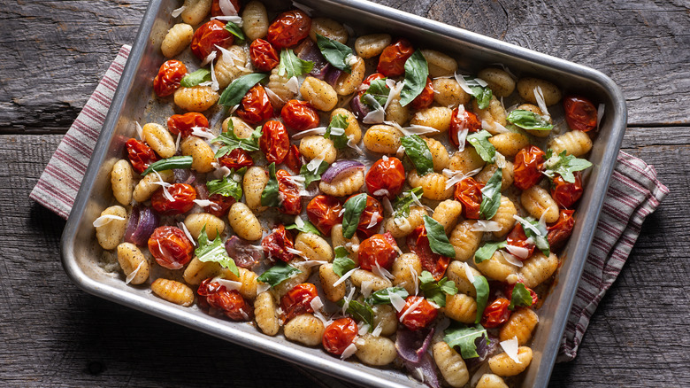 Gnocchi on a sheet pan with tomatoes