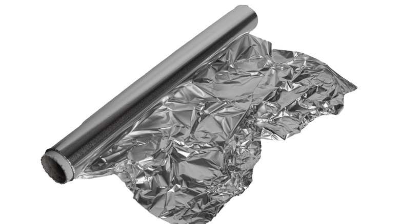 Roll of crinkled aluminum foil