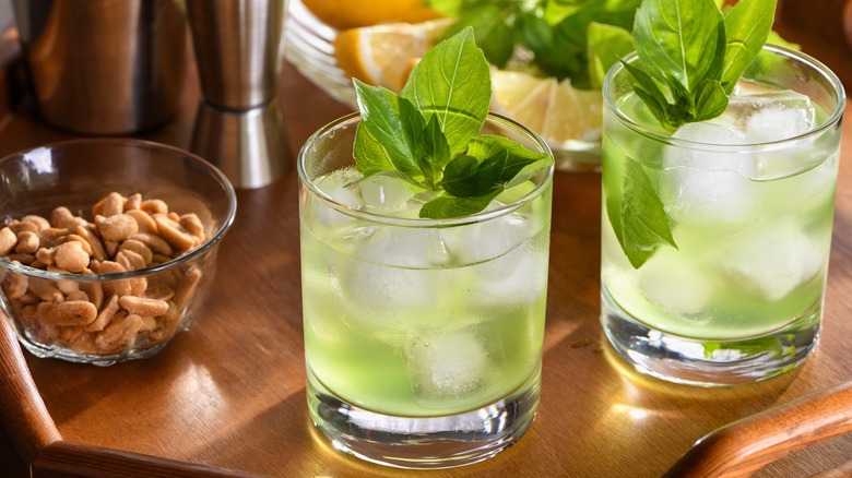 Two basil gimlet cocktails