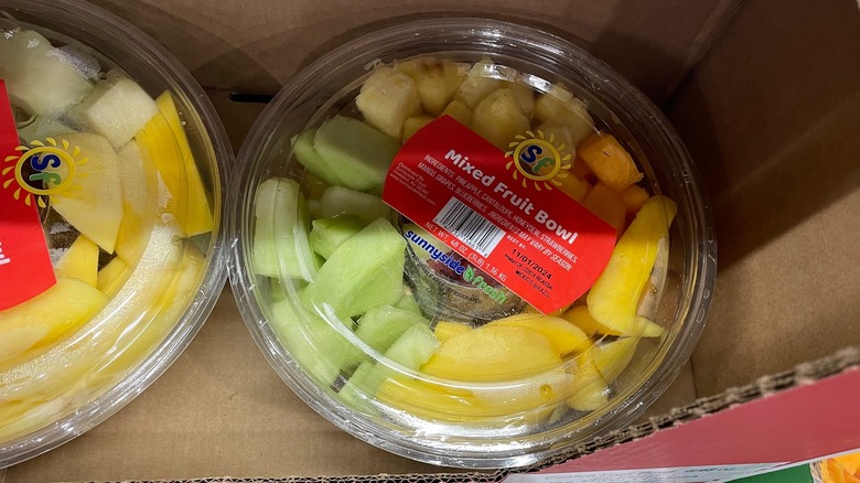 A mixed fruit bowl from Costco with a lid