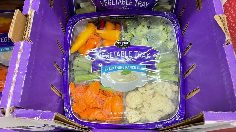 An unopened vegetable tray from Costco with ranch