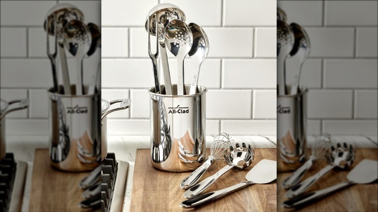 Silver kitchen utensils in vase