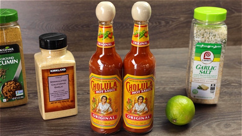 Cholula hot sauce glass bottle with wood cap