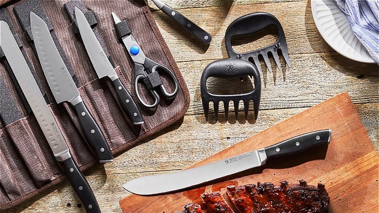 Knives and bbq utensils on table