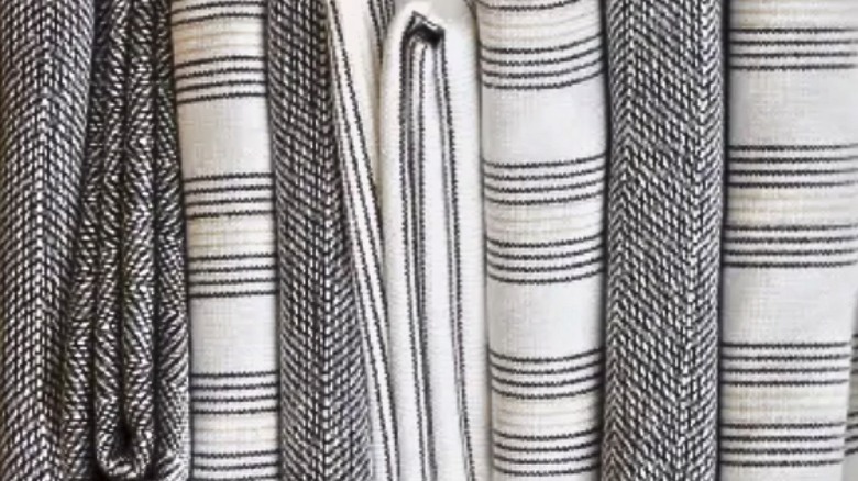 White towels with black stripe patterns