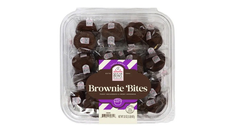 Individually wrapped brownie bites in a clear plastic container