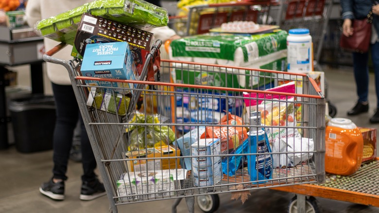 Costco cart with groceries and other household goods