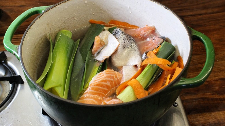 pot of salmon and vegetable scraps