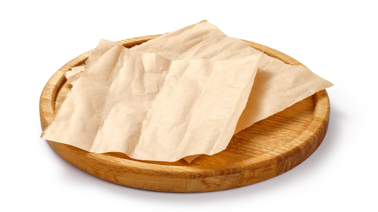 Parchment paper on wood board