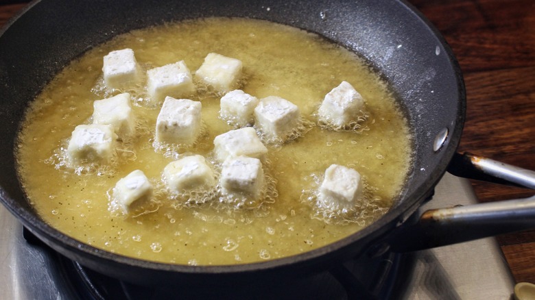 frying tofu cubes
