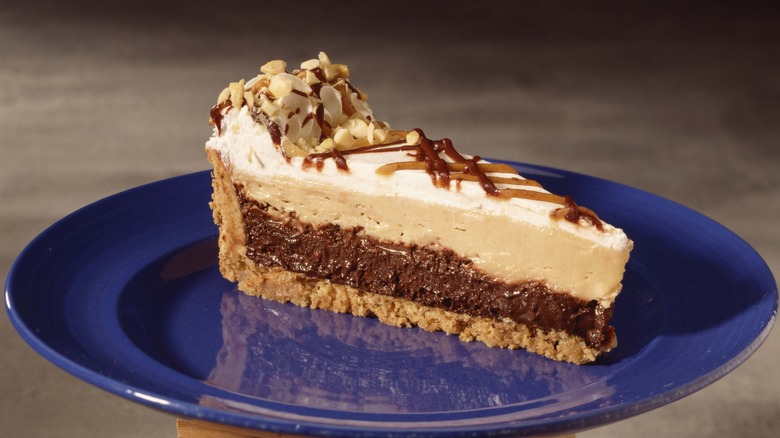 Slice of chocolate peanut butter pie on a plate