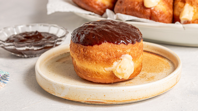 Boston cream donut on a plate