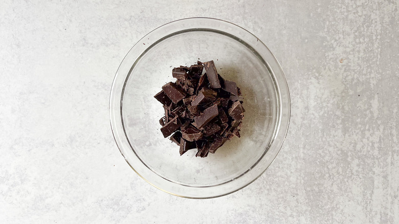 Chopped dark chocolate in bowl