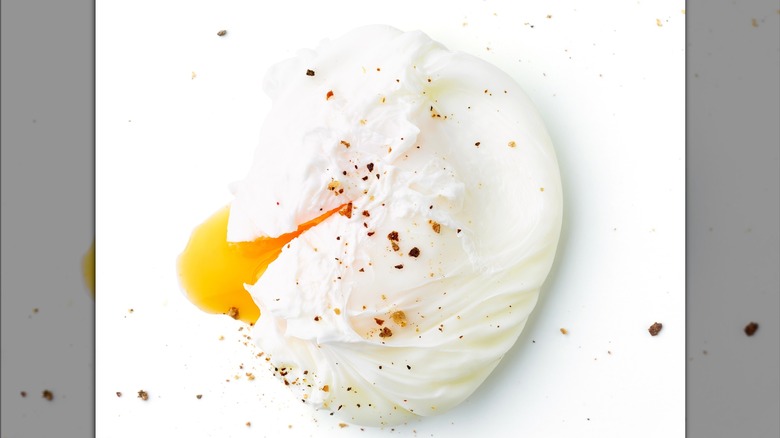Poached egg sprinkled with pepper