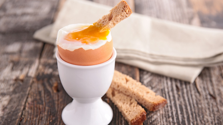 soft boiled egg with a toast strip