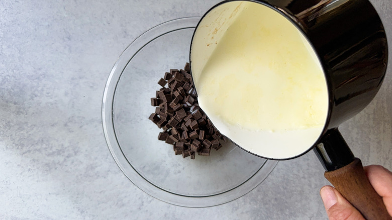 cream pouring over chocolate