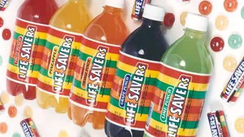 Bottles of Life Savers soda with candy in the background