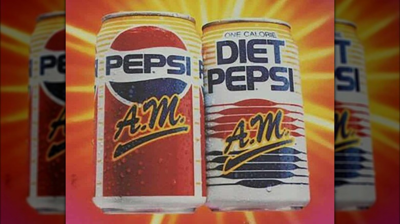 Two cans of Pepsi A.M. soda, one regular and one diet